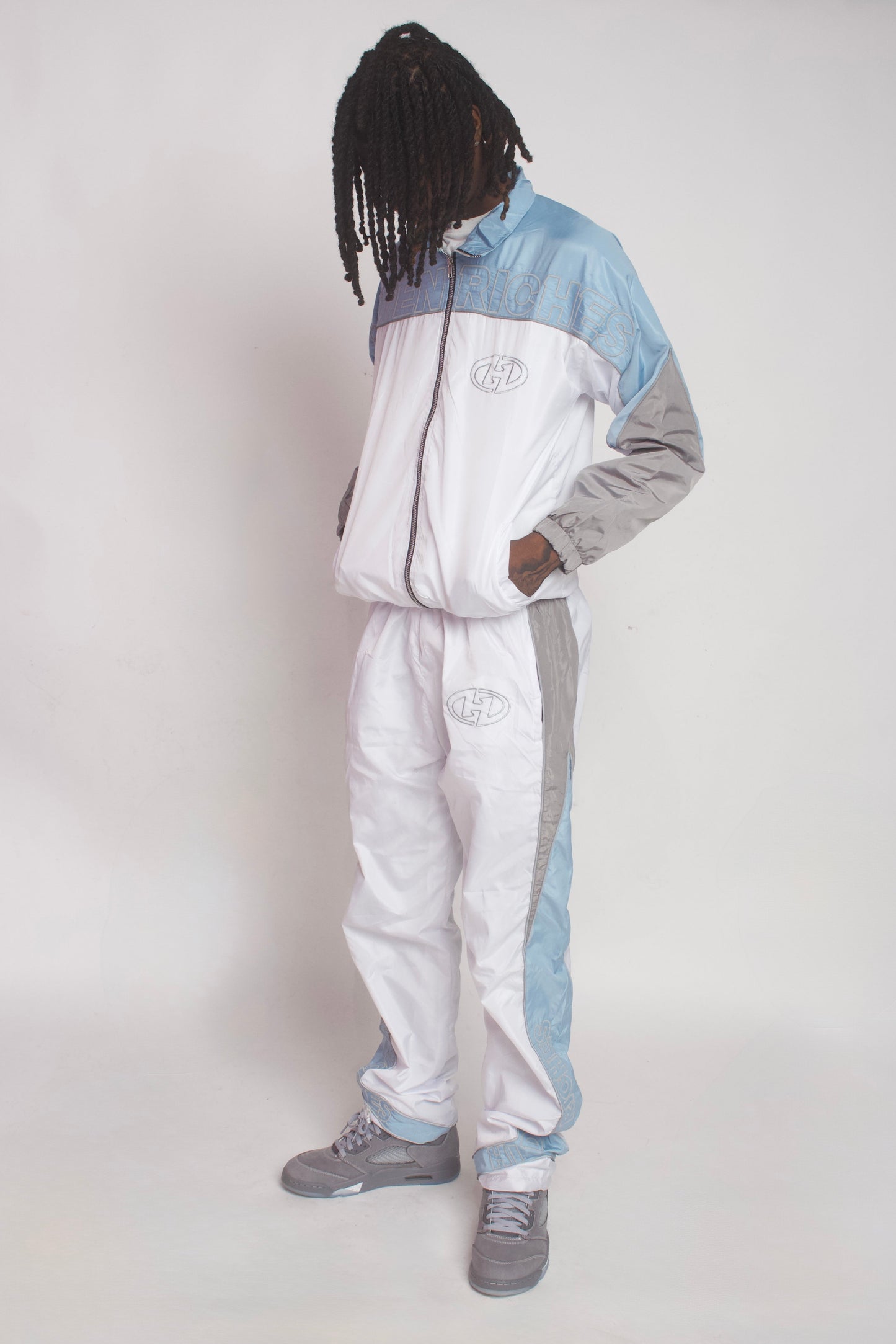 HIDDEN RICHES WINDBREAKER PANTS SETS